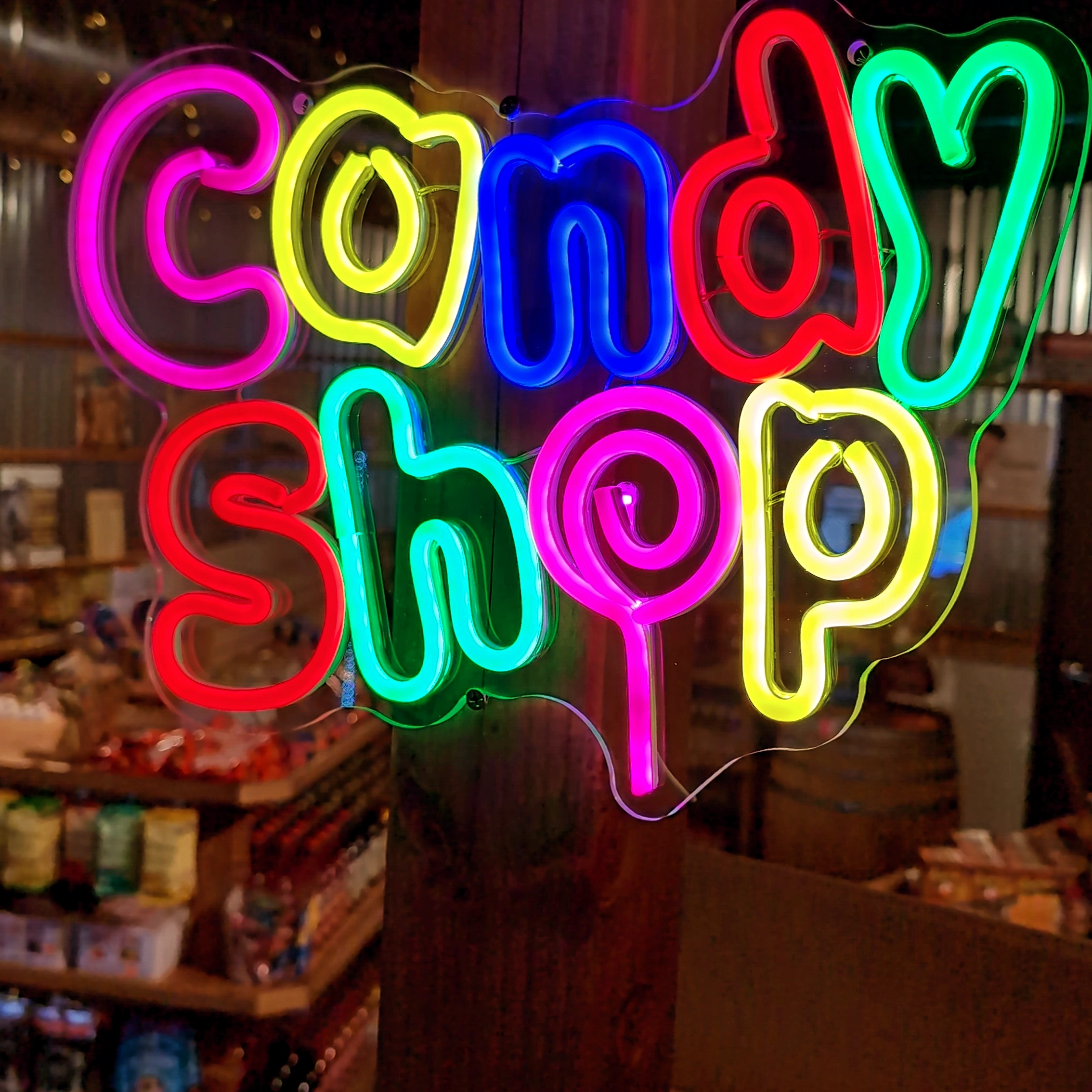 Neon candy shop sign at Rocket Fizz, candy and soda shop in Newhall, California.